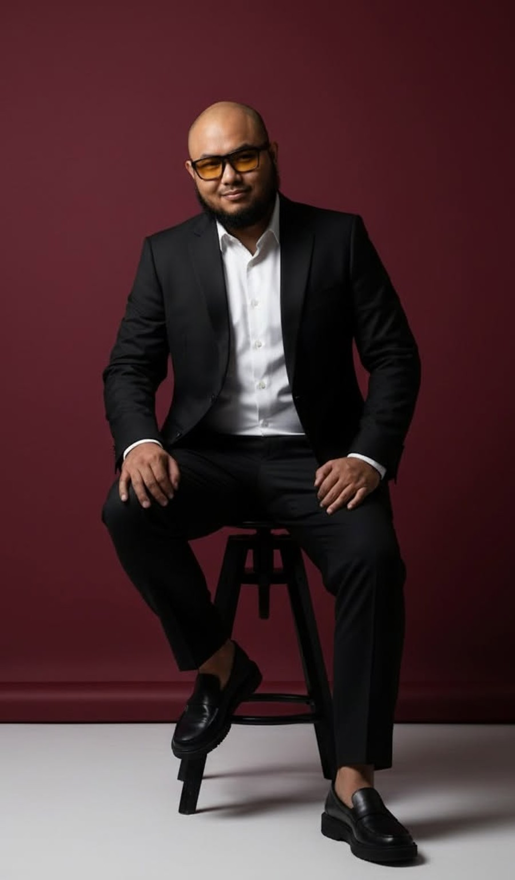 Portrait of Lorenzo Arriesgado in a dark suit